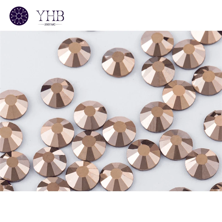 Rose Gold Nails with Gems Rose Gold Nails with Gems